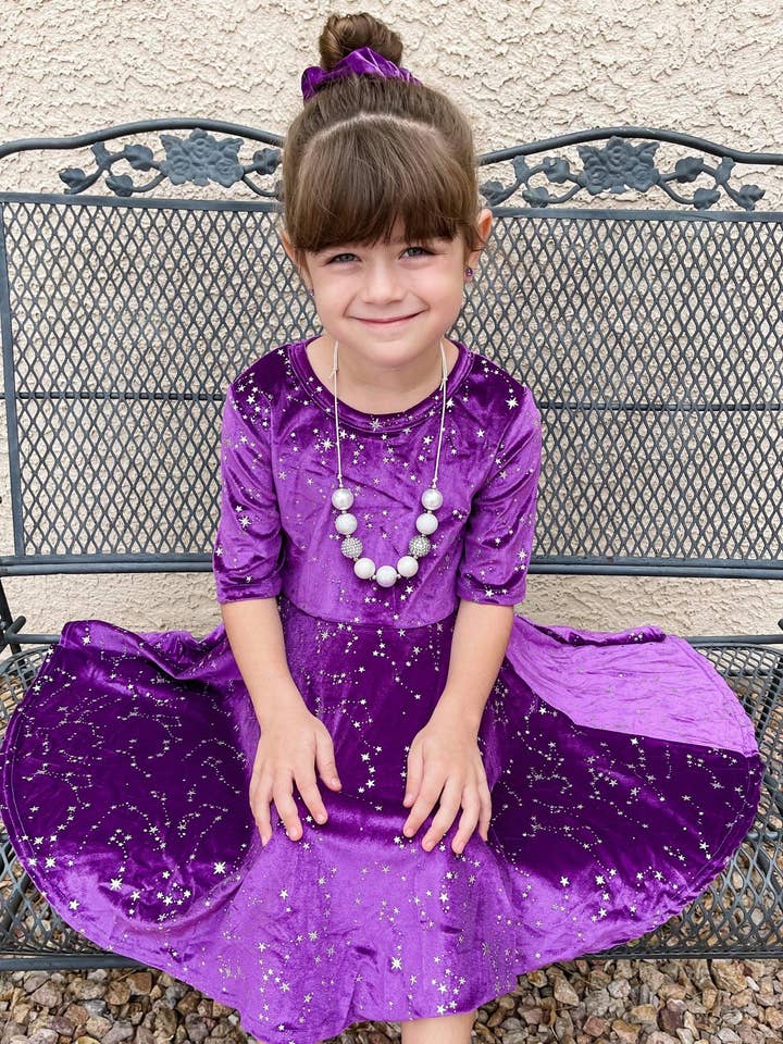 Purple Twirly Velvet Dress with Silver Stars for wholesale by Little dress shoppe