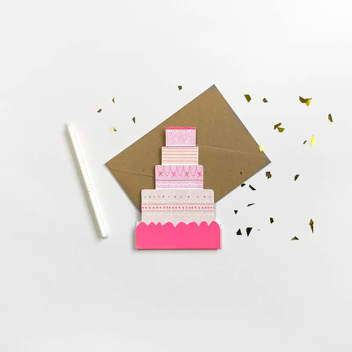 A happy cake for wholesale by Sophie Kinns