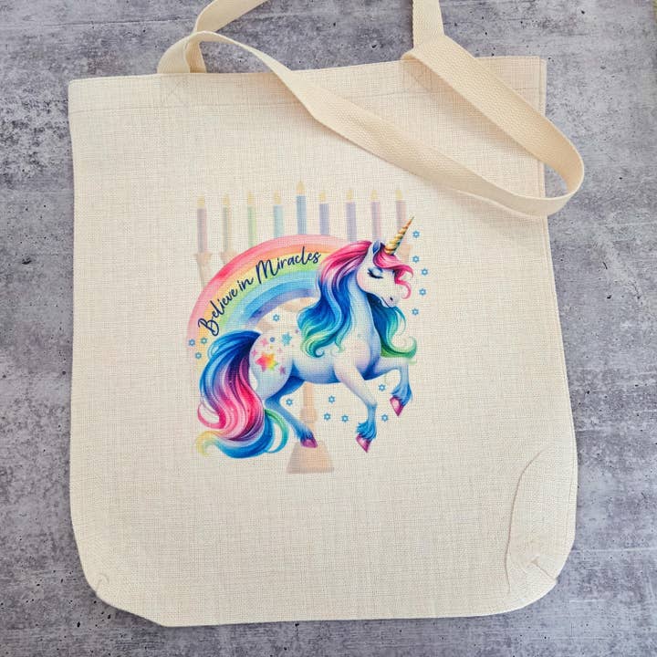 Believe in Miracles Unicorn Menorah Tote Bag for wholesale by Salt Sparkle Shalom
