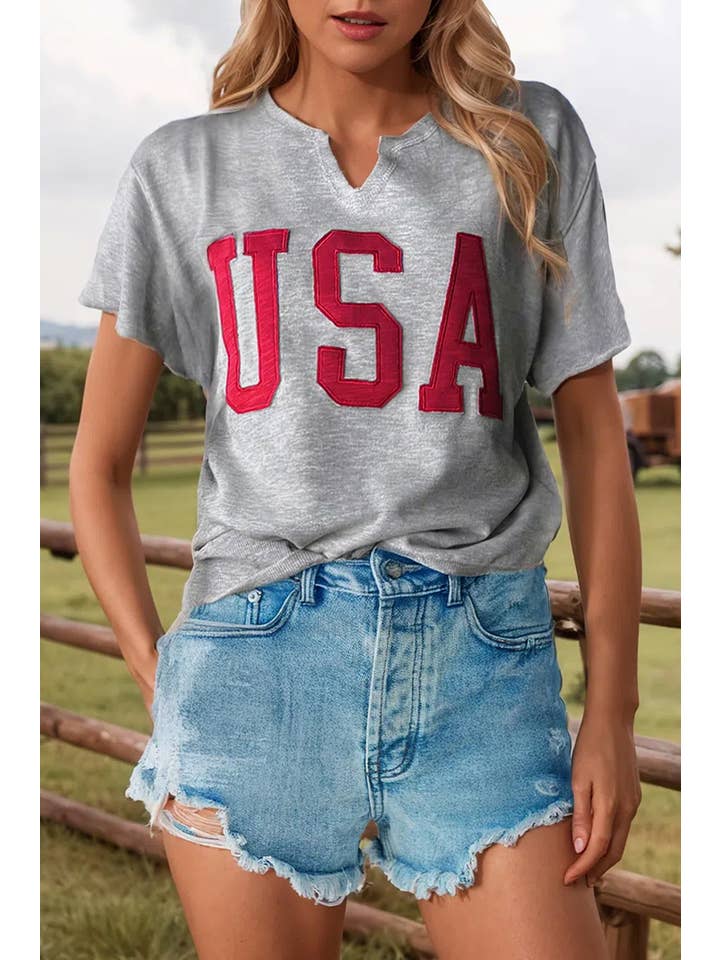 As shown Fashion-W USA Lettering Patch Notched Neck Loose Tee for wholesale on Faire