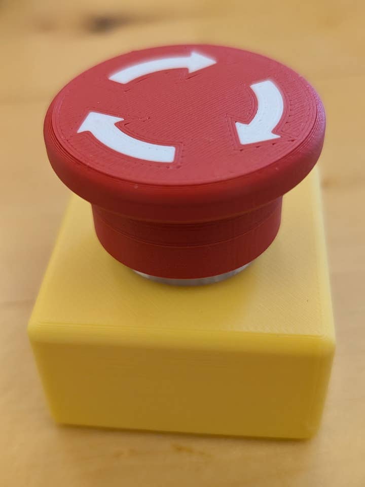 E-Stop Fidget Clicker for wholesale by Sapphic Space