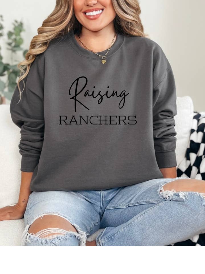 Raising Ranchers Graphic Sweatshirt for wholesale by Rock n' Rodeo