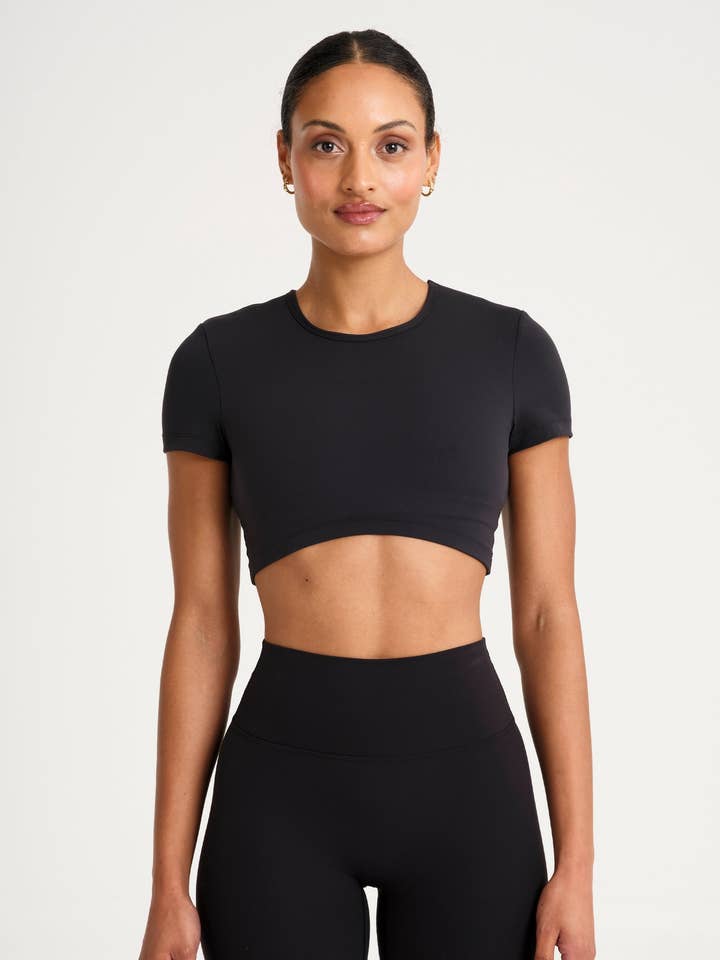 Black ALLFENIX CloudCore Cropped Built-In Bra Tee for wholesale on Faire0