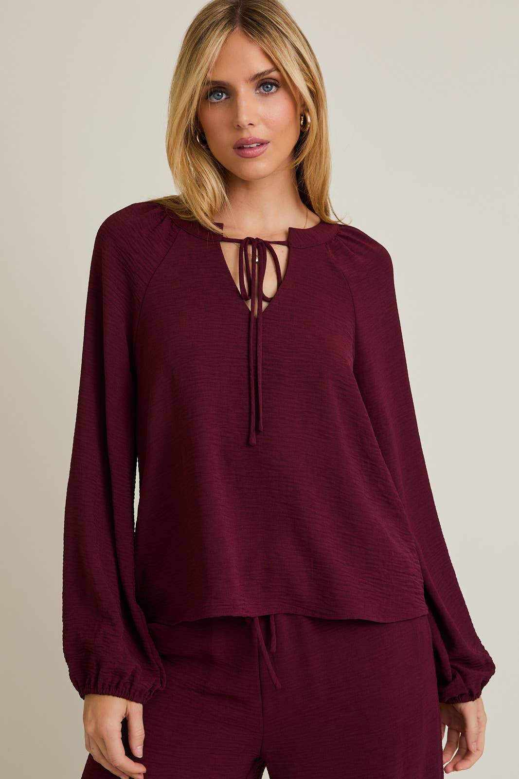 WINE FRONT TIE LONG SLEEVE TOP for wholesale on Faire0