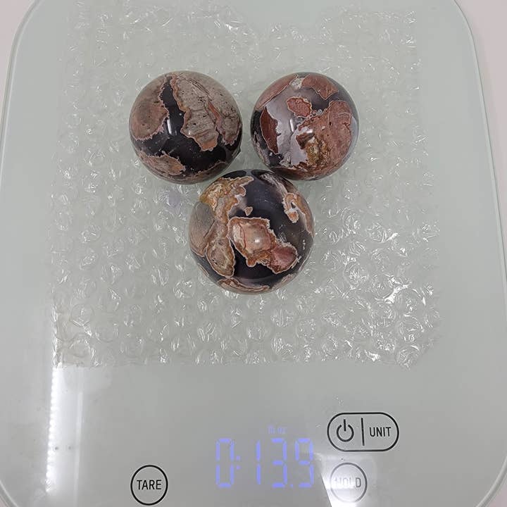 13.9 oz Football Agate Spheres for wholesale by The Cozmic Cauldron