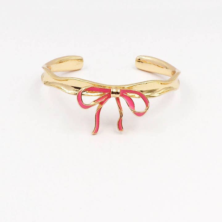 Gold Metal Hammered Cuff with Hot Pink Bow for wholesale by What's Hot