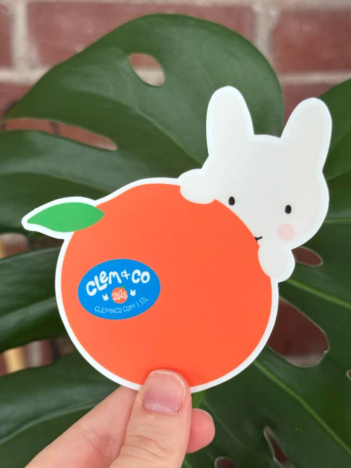 Clem the Bun with her Clementine Sticker for wholesale by Clem & Co.