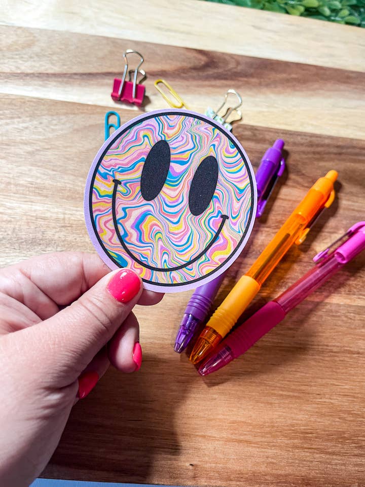 Neon Swirly Smiley Face Sticker for wholesale by Sharp Thoughtlings