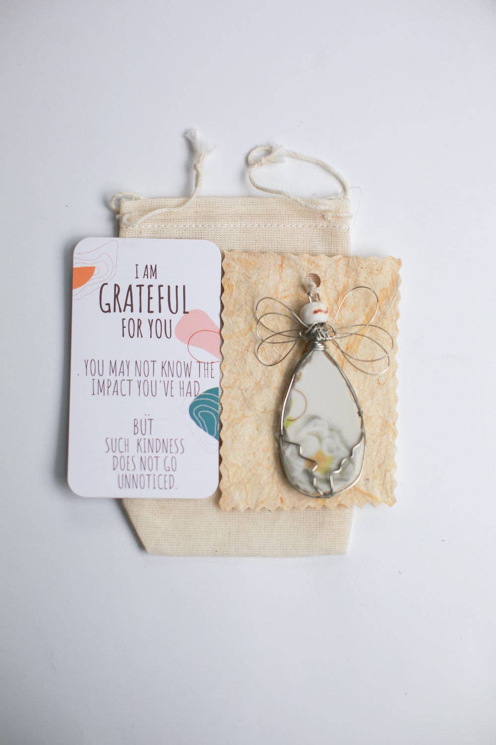 2nd Story Goods + Haiti Design Co - Wholesale Keepsake Coin/Token - Giving Angel6