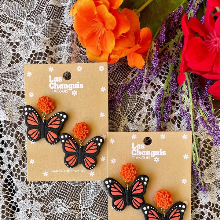 Handmade Monarch Butterfly Earrings with Cempasuchil Flowers - Day of the Dead Collection - Dia de los Muertos Jewelry and other Purchase Wholesale dia los muertos. Free Returns & Net 60 Terms on Faire trending on Faire.