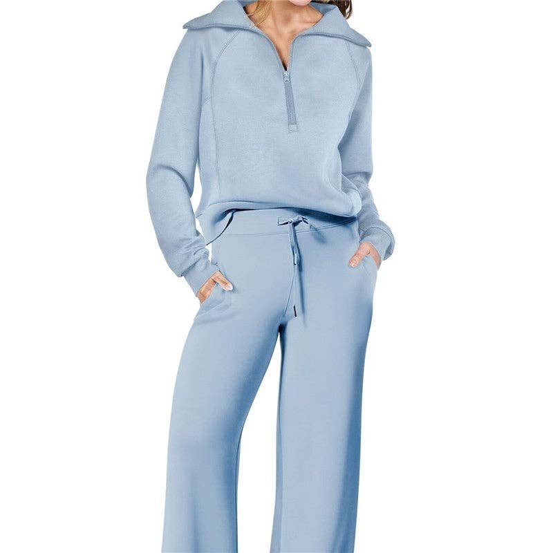 Plush Looks – wholesale Mjukisset – Dam – Set med halvzip-tröja i ren färg och joggers med vida ben1