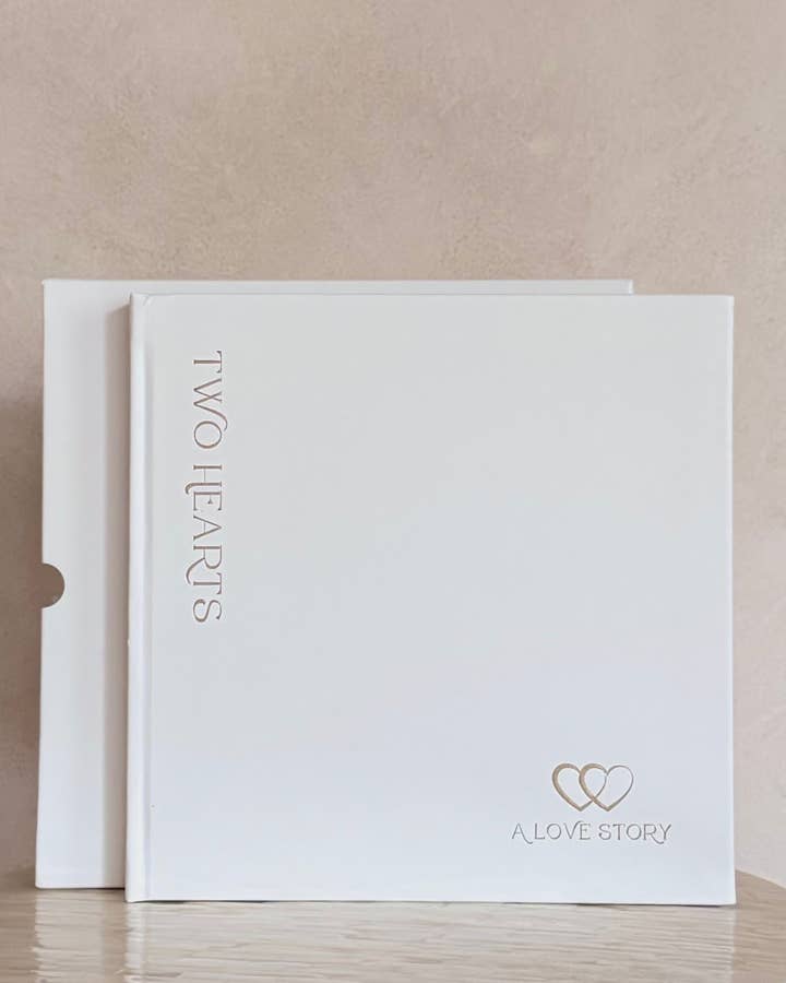 Premium Ivory Leather "Two Hearts - A Love Story" Couples Journal for wholesale on Faire0
