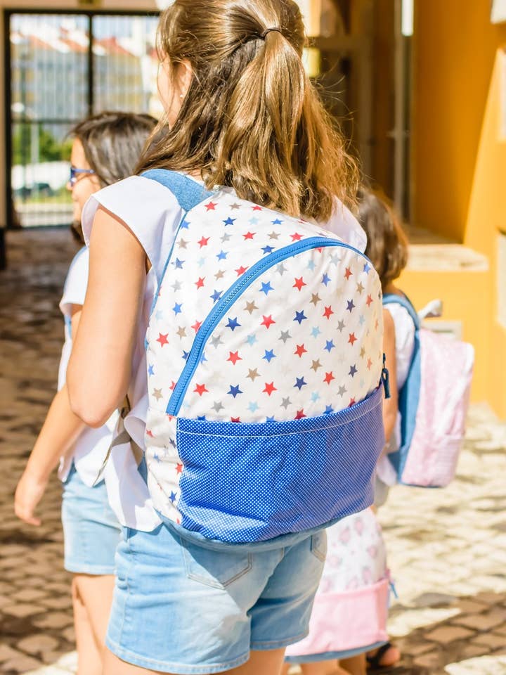 Zaino Stelline blu e rosse e tasca blu a pois per la vendita all'ingrosso da parte di Pêra Doce