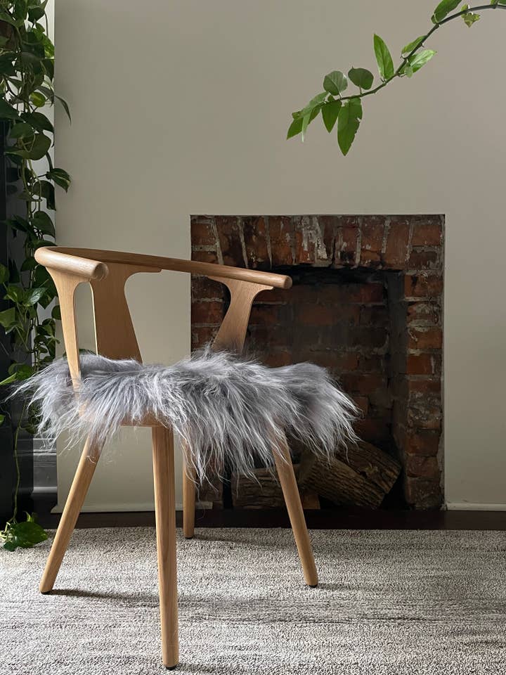Silver Icelandic Sheepskin Chair Pad for wholesale by Black Sheep (White Light)