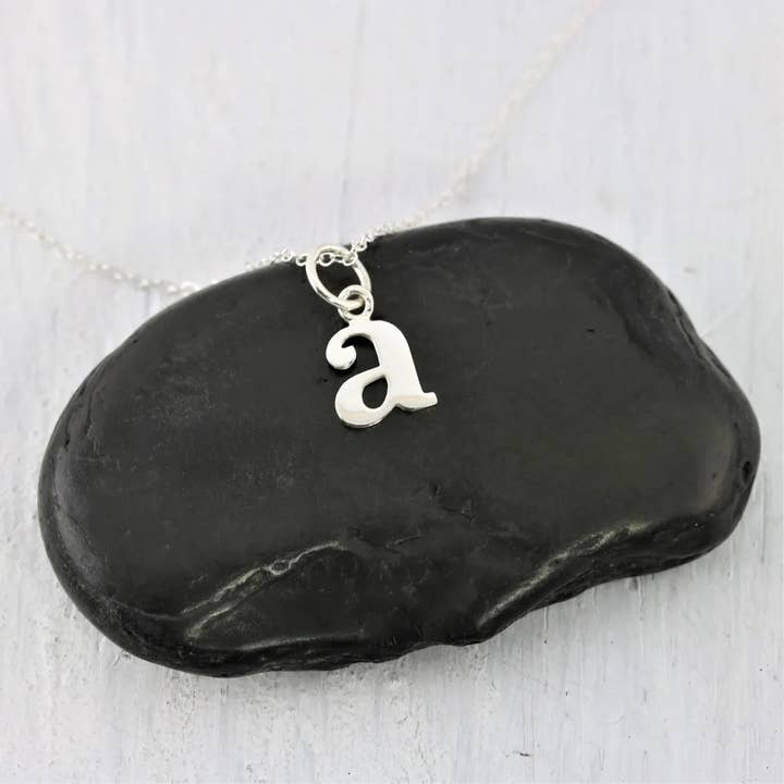 Tiny Typewriter Initial Necklace – Choose Your Letter, Sterling Silver Charm on 18" Chain for wholesale by CY Design Studio