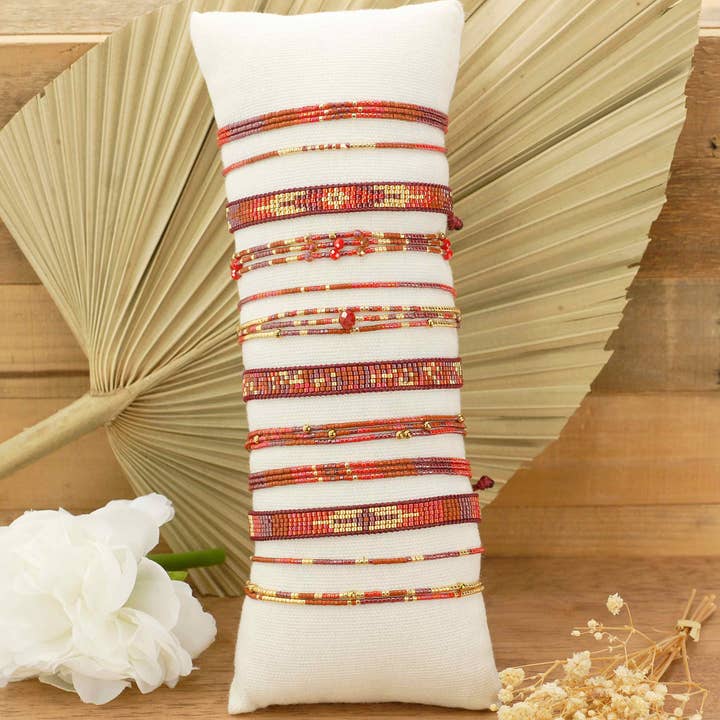12 Bracelets coulissants multi rangs pour la vente par Merveilles du Monde