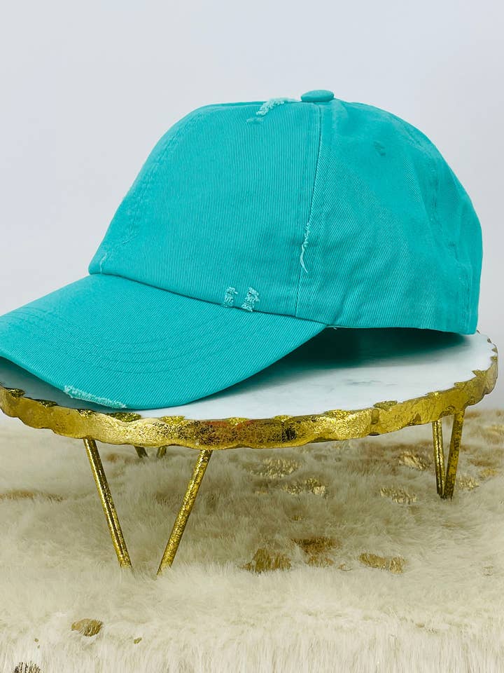 Mint Ladies Distressed Ponytail Hat for wholesale by Magnolia & Peach Jewelry Boutique, LLC