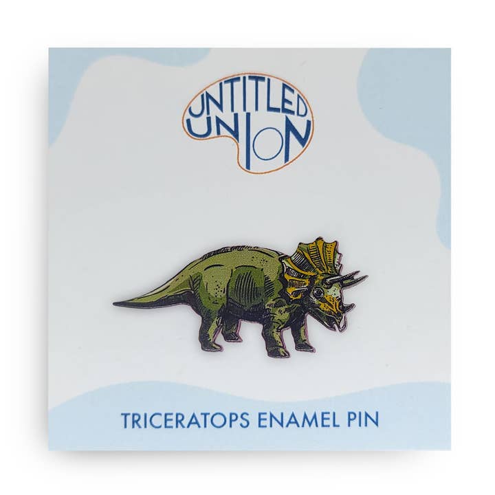 Spilla in smalto a forma di dinosauro Triceratopo per la vendita all'ingrosso da parte di Untitled Union
