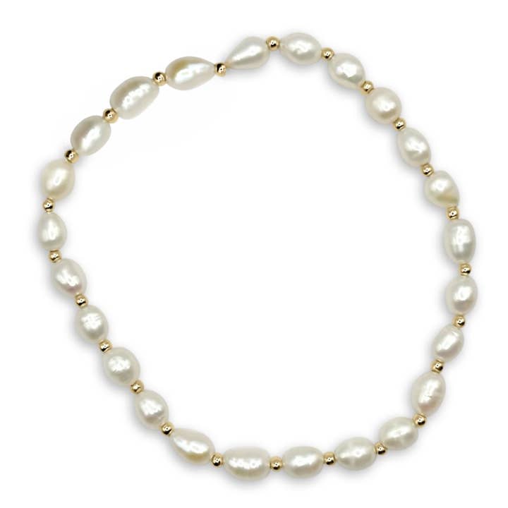 Bracelet extensible délicat en perles d'eau douce pour la vente par Camilla Limón