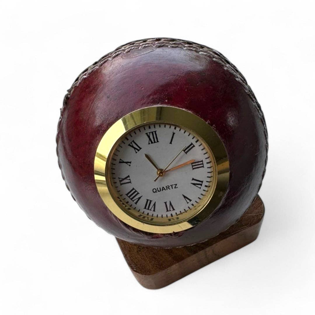SPORTGIFTZ – wholesale Desk clock – CRICKET-GIFTS - Quartz Cricket Ball Clock | Unique Sporting Design | Durable Leather & Brass | Precise Timekeeping | Decorative Centrepiece, Red, One Size, Wood1