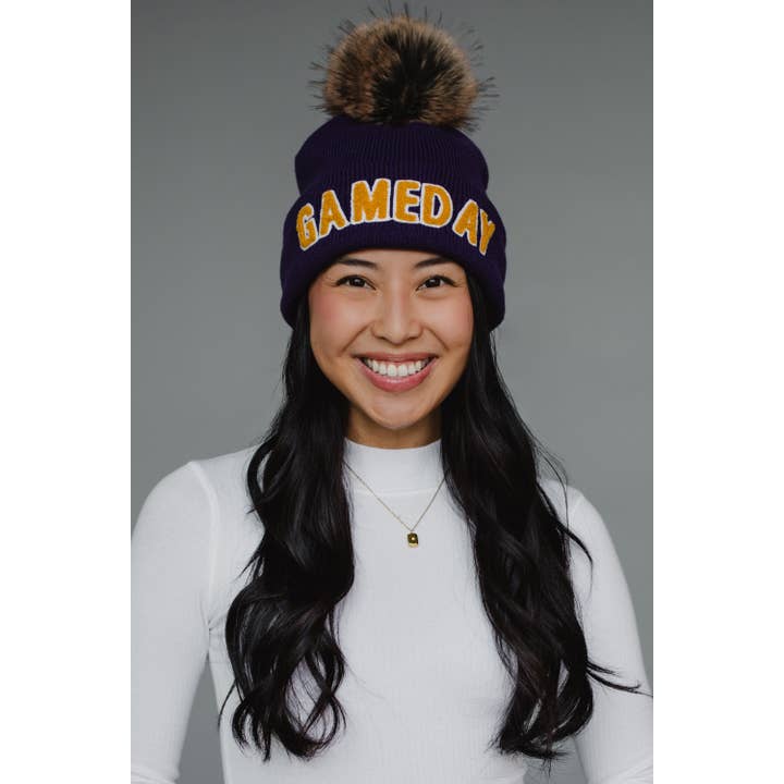 Purple & Gold Game Day Pom Hat and other Purchase Wholesale gameday hat. Free Returns & Net 60 Terms on Faire trending on Faire.