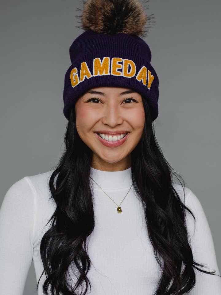 Purple & Gold Game Day Pom Hat for wholesale by Panache Apparel Co.