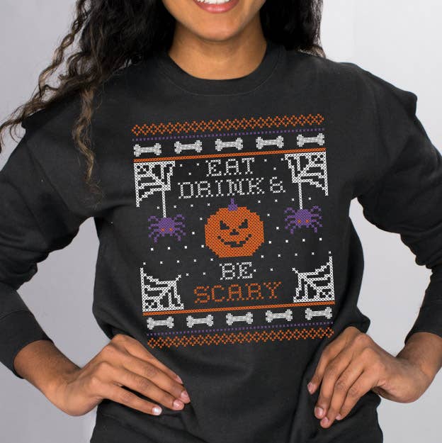 Black Eat Drink and Be Scary Sweatshirt for wholesale on Faire1