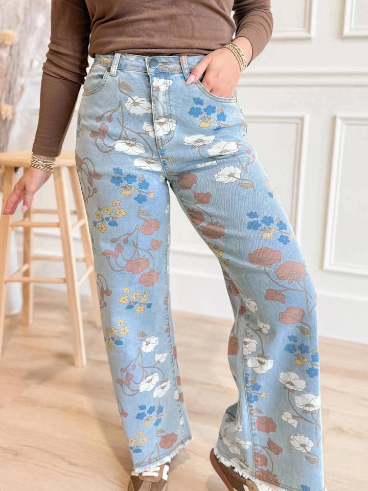 Sky Blue Floral Printed Raw Hem Shift Jeans for wholesale by Molly & Me Boutique
