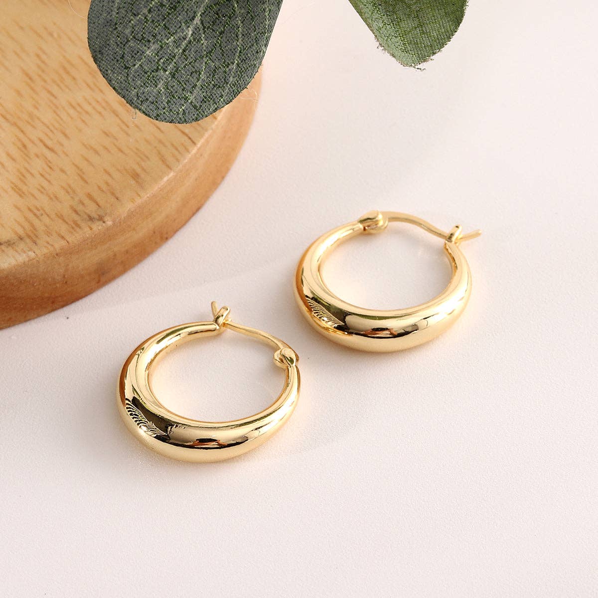 Amy and Annette - Wholesale Huggie Earrings - 14K Gold Graduated Hoop Huggie Earring2