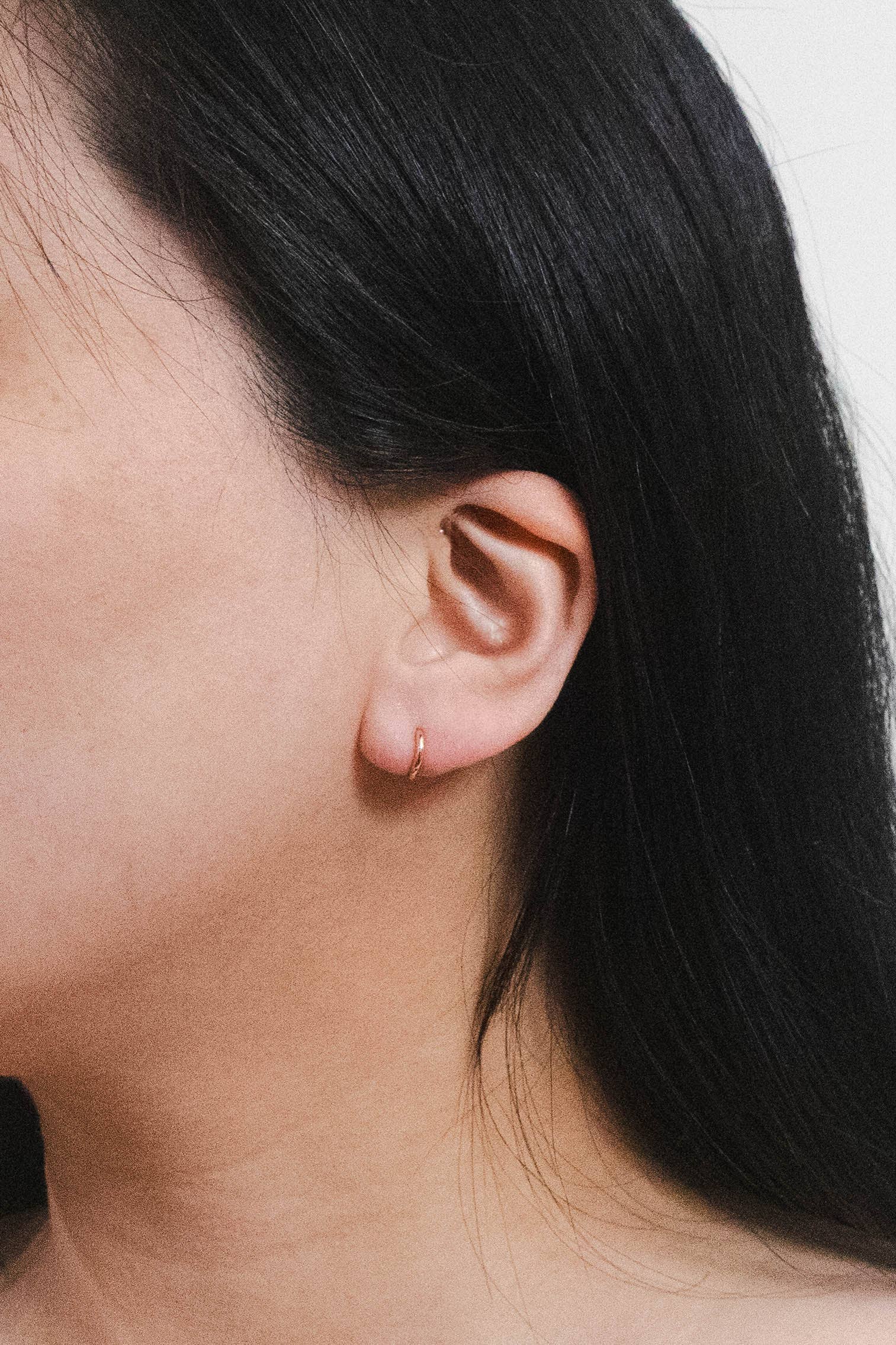 Lovoda - Wholesale Huggie Earrings - Ultra Mini Huggie Hoop Earrings | Gold1