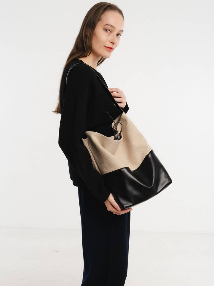 Sac bucket porté épaule en toile garni cuir pour la vente par JULIA PARIS