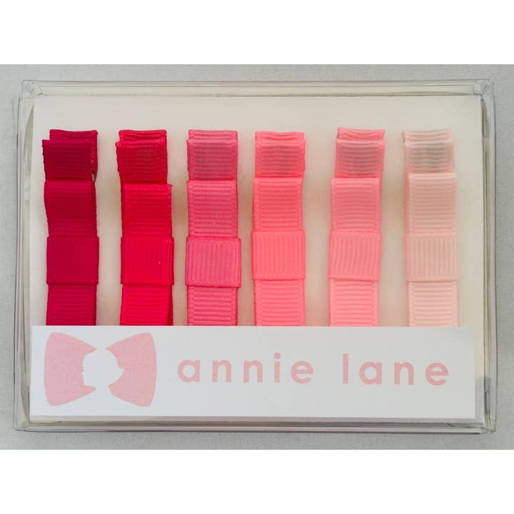 Boîte de 6 nœuds pour cheveux - roses pour la vente par Annie Lane