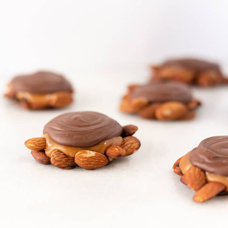 Maggie Lyon Chocolatiers - Wholesale Chocolate Covered Sweets - Milk Chocolate Almond Paws     / 4lb. Case1