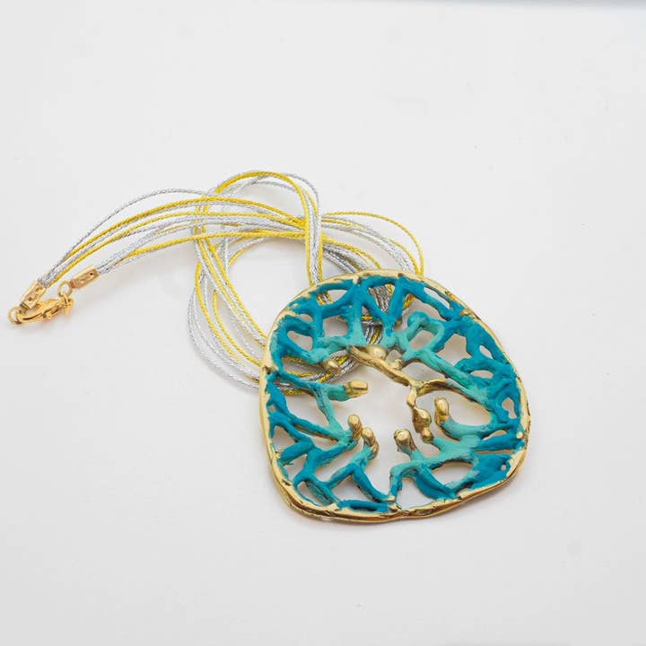 Radix Orbis Pendant for wholesale by YuuJewels