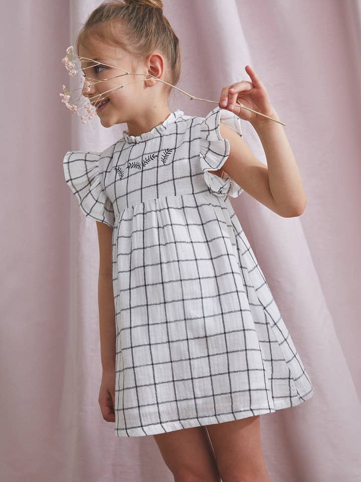 Robe blanche à carrés noirs pour fille pour la vente par Dadati