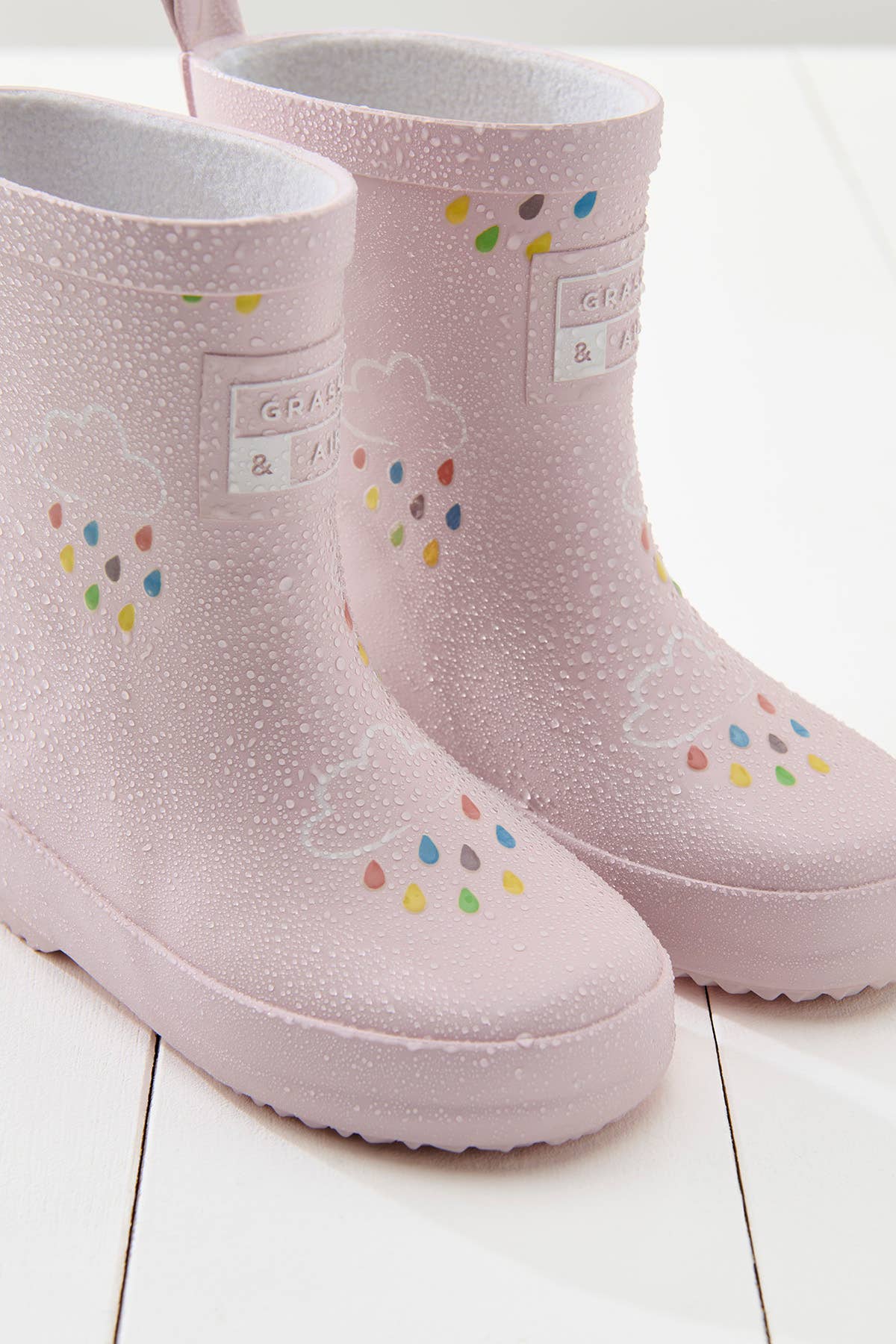 Grass & Air - Vente Bottes de pluie – enfant - Bottes enfant en rose bébé révélant la couleur1