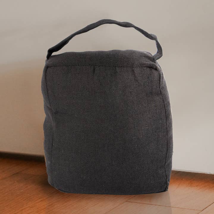 Decorative Fabric Weighted Door Stopper for home and office and other Purchase Wholesale door stop. Free Returns & Net 60 Terms on Faire trending on Faire.