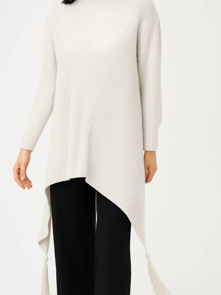 SOFT MULTI DIRECTIONAL KNIT JUMPER WITH ELONGATED SIDES AND  for wholesale by Lucy Sparks