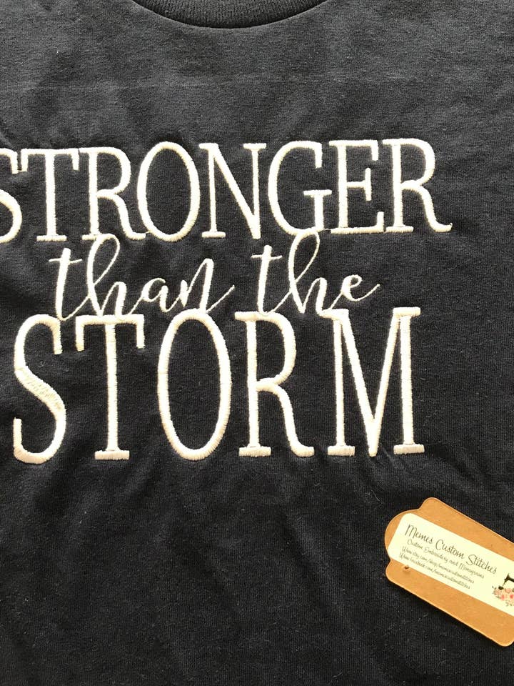 Stronger than the Storm Unisex Adult Simple Christian Crew for wholesale by Memes Custom Stitches LLC