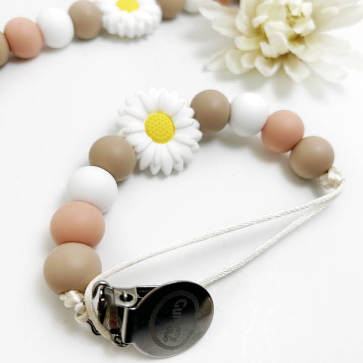 Attache-tétine en silicone fleur de marguerite – Cadeau neutre pour bébé et autres tendances Résultats pour attache tétine silicone en vente B2B. Retours gratuits et paiement à 60 jours sur Faire sur Faire.