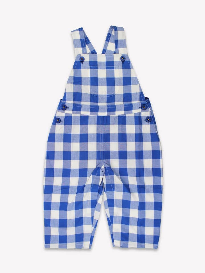 Salopette per bambini in cotone biologico con motivo a grandi quadri blu. per la vendita all'ingrosso da parte di Toby Tiger GmbH