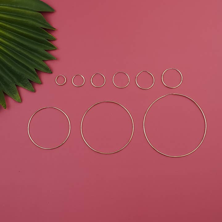 Or Créoles rondes sans fin 14 carats en vente sur Faire2