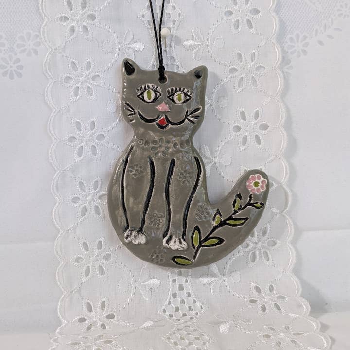 Hand-painted multi-colored cat ornament with decorative trim for wholesale by CurlyFernCeramics