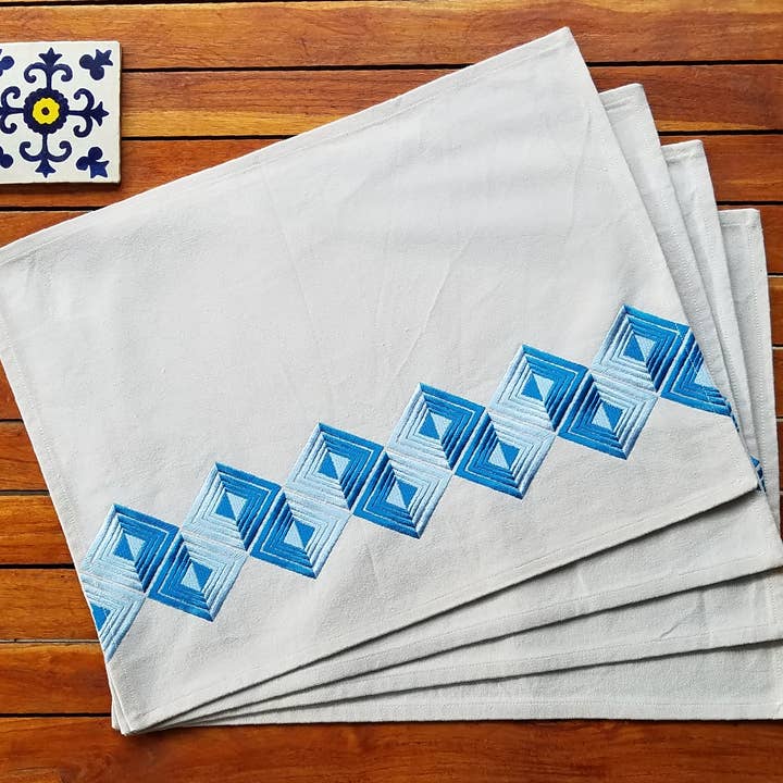 Cotton placemats with embroidery in shades of blues for wholesale by Indigostep