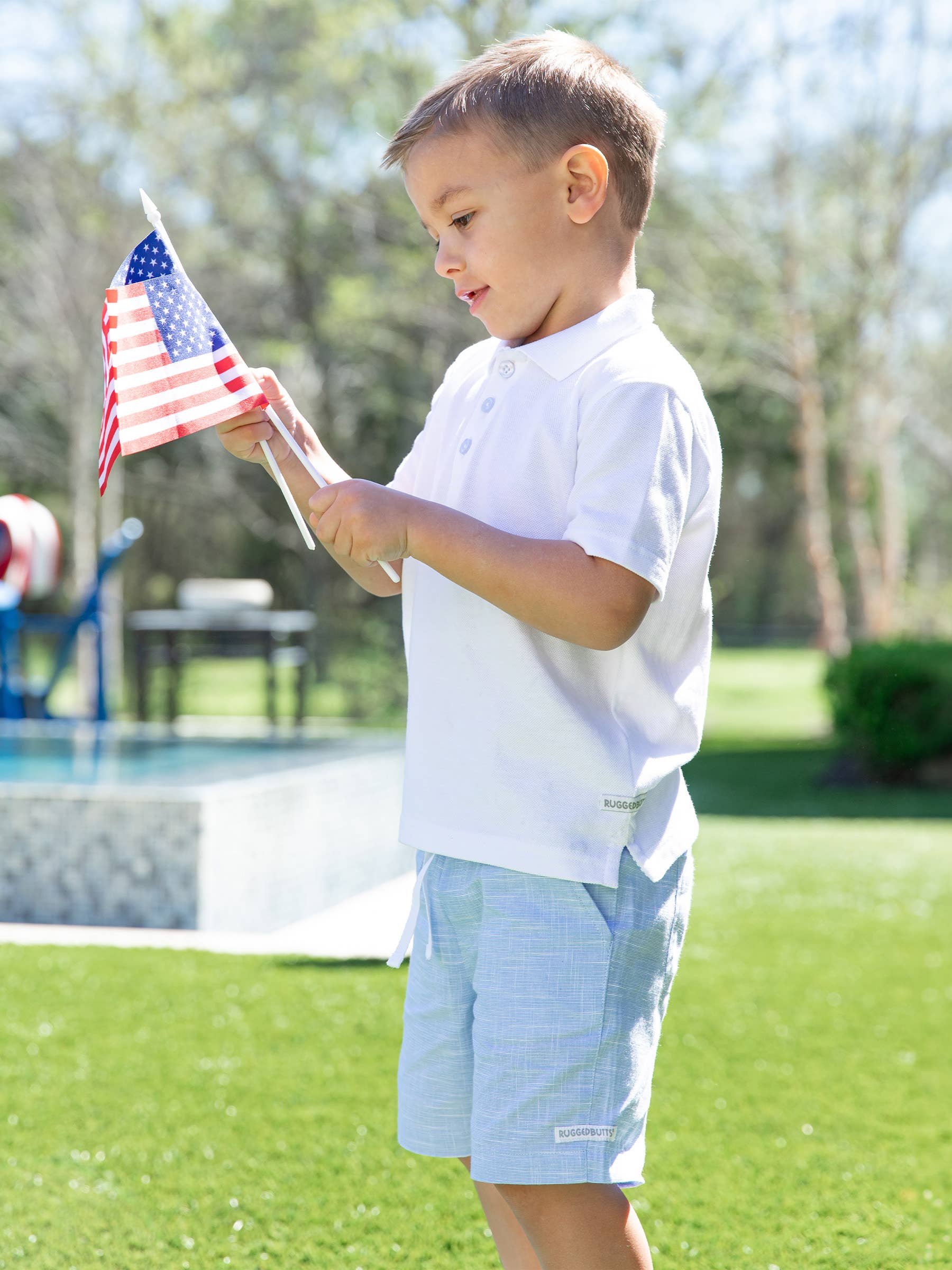 Boys White Pique Short Sleeve Polo Shirt for wholesale on Faire4