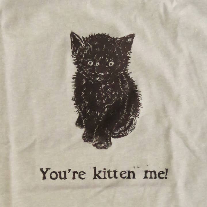 Handprinted T-shirt "You're Kitten Me!" for wholesale by Sarah Drummond Art