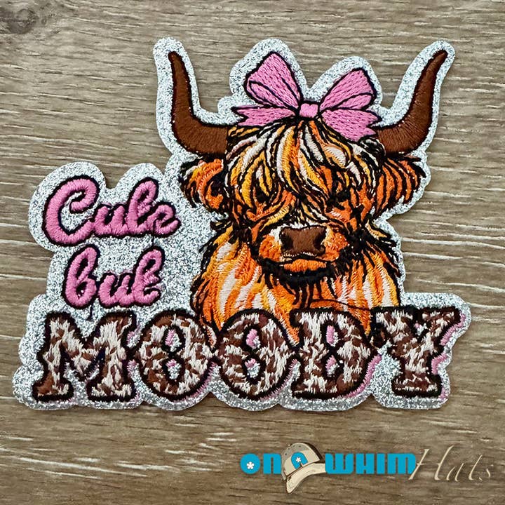 Cute but Moody Highland Cow Iron-On Patch for wholesale by On a Whim Hats
