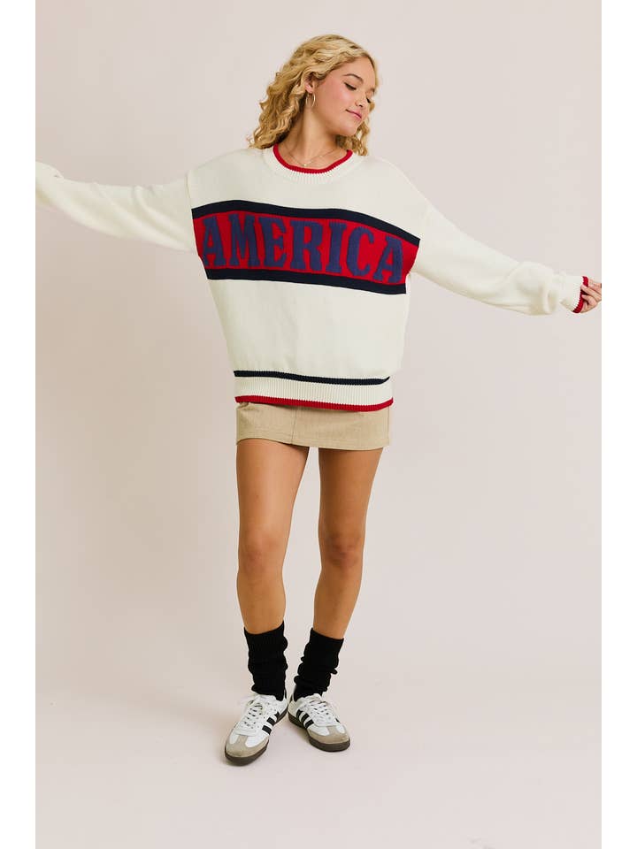 WHITE MULTI "AMERICA" GRAPHIC LONG SLEEVE CREW NECK SWEATER for wholesale on Faire