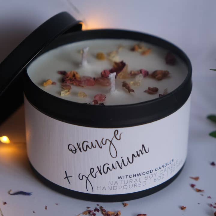 Geranium and Orange scented soy candle in matte black tin for wholesale by Witchwood Candles