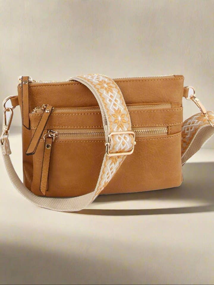 LQ342-Z Melissa Multi Zip Pocket Crossbody With Guitar Strap for wholesale by MiMi Wholesale